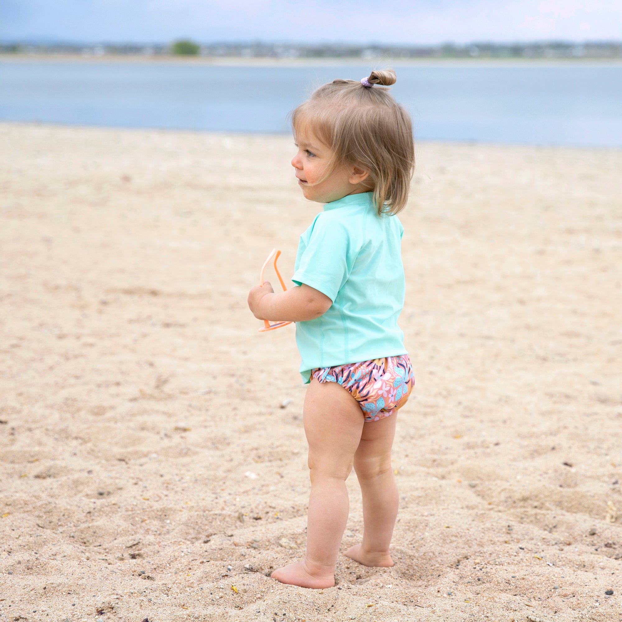 Image of toddler wearing a Thirsties Swim DIaper in Mala