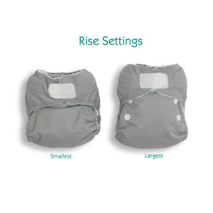 -Image of Thirsties Natural Newborn All in One with hook and loop closure. Image shows diaper on smallest and largest rise settings.