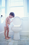 image of child by toilet