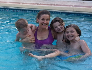 image of family in pool