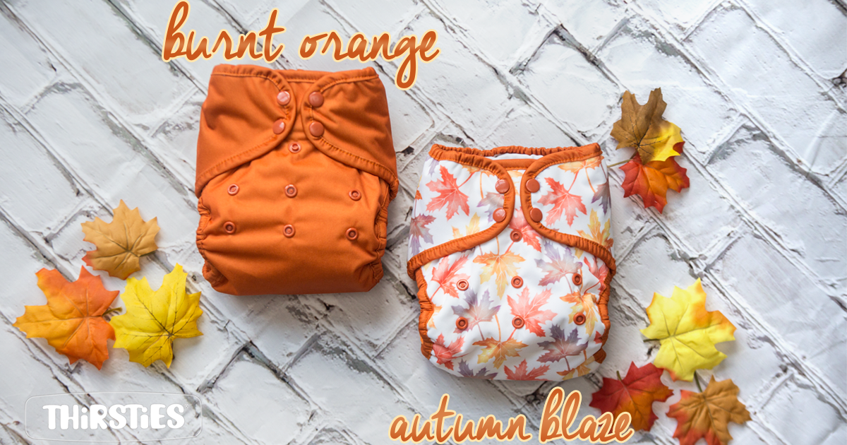 image of diapers in orange and leaf print