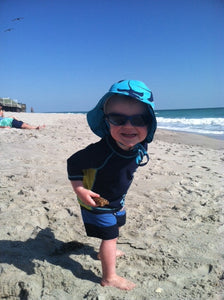 image of child on beach