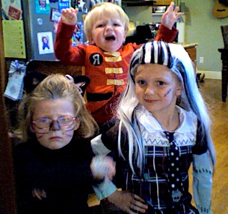 image of halloween costumes on kids