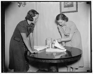 image of two women folding diapers