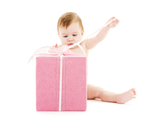 image of baby with present