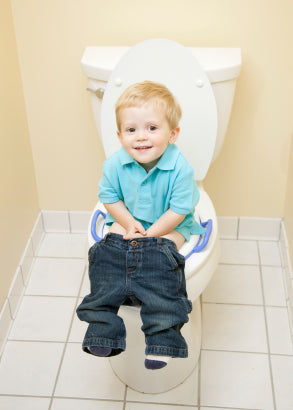 image of toddler using potty