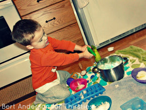 image of child playing on floor