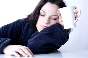 image of woman holding coffee mug