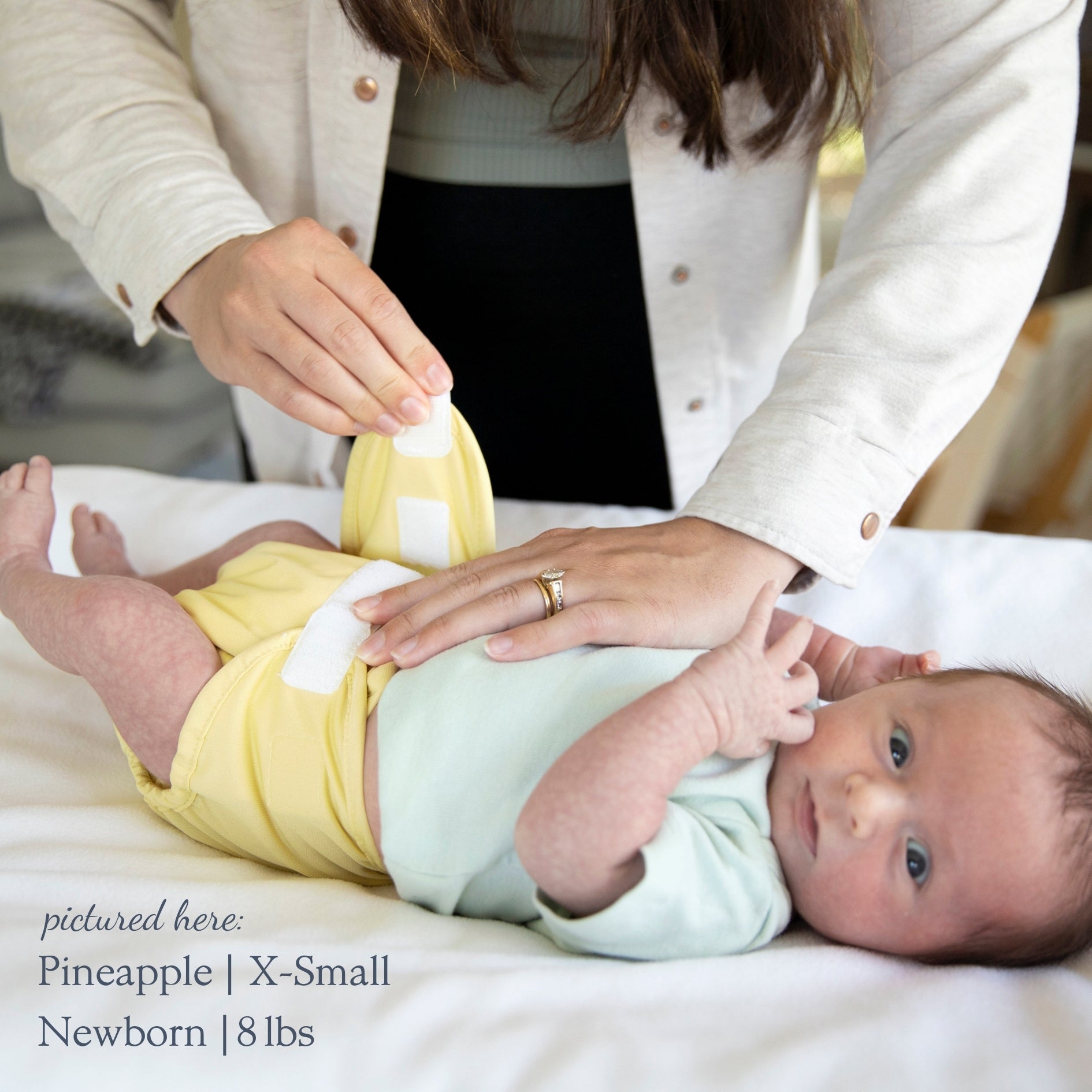 -Image of X-Small Diaper Cover on a newborn