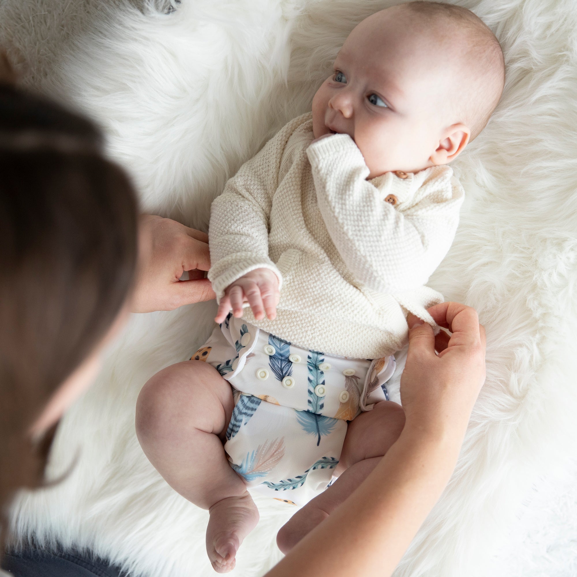 Image of baby wearing a Thirsties Cloth Diaper in Wild Plume