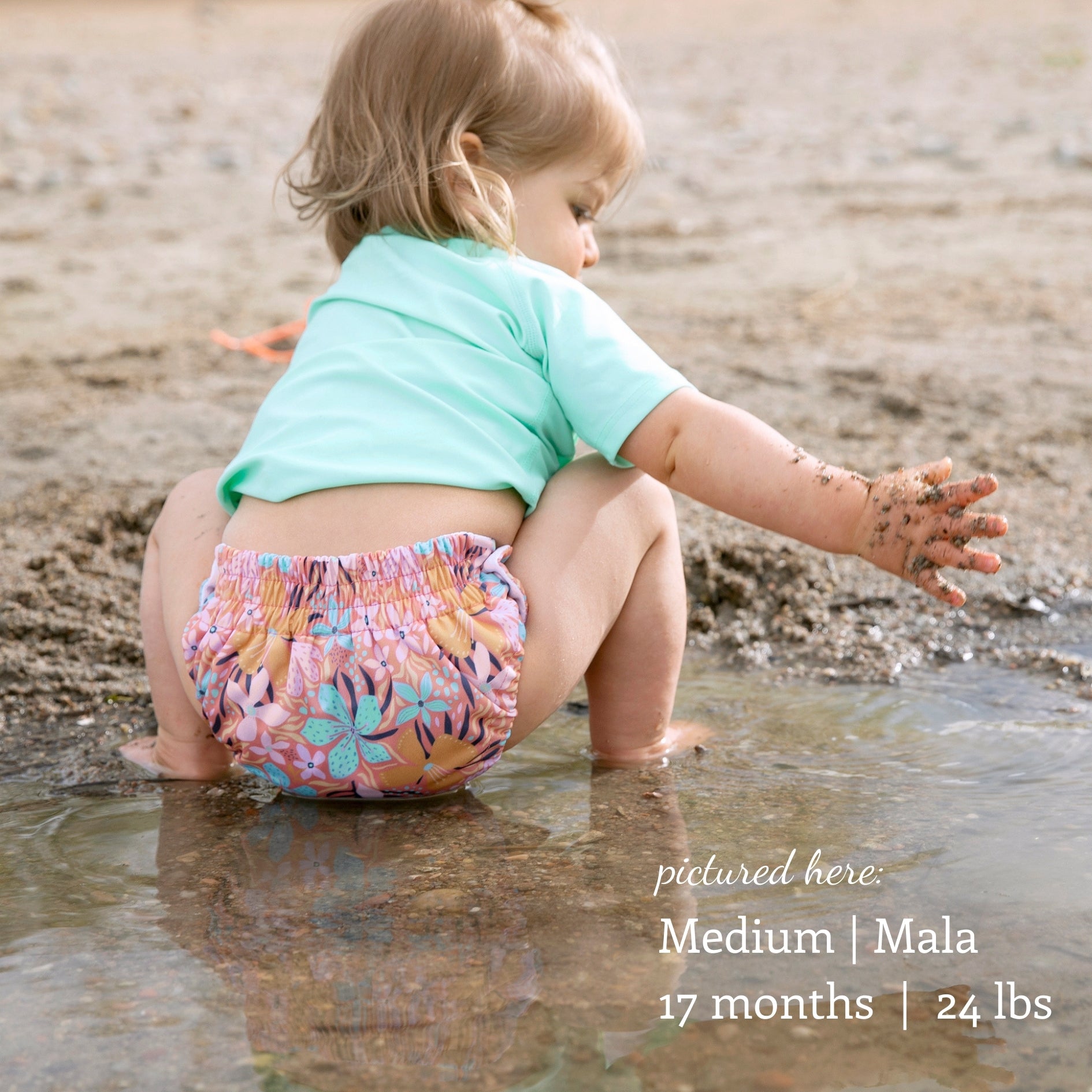 -Image of baby wearing a Thirsties Swim DIaper Size Medium