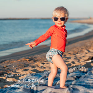 -Image of toddler wearing a Thirsties Swim DIaper Size Medium