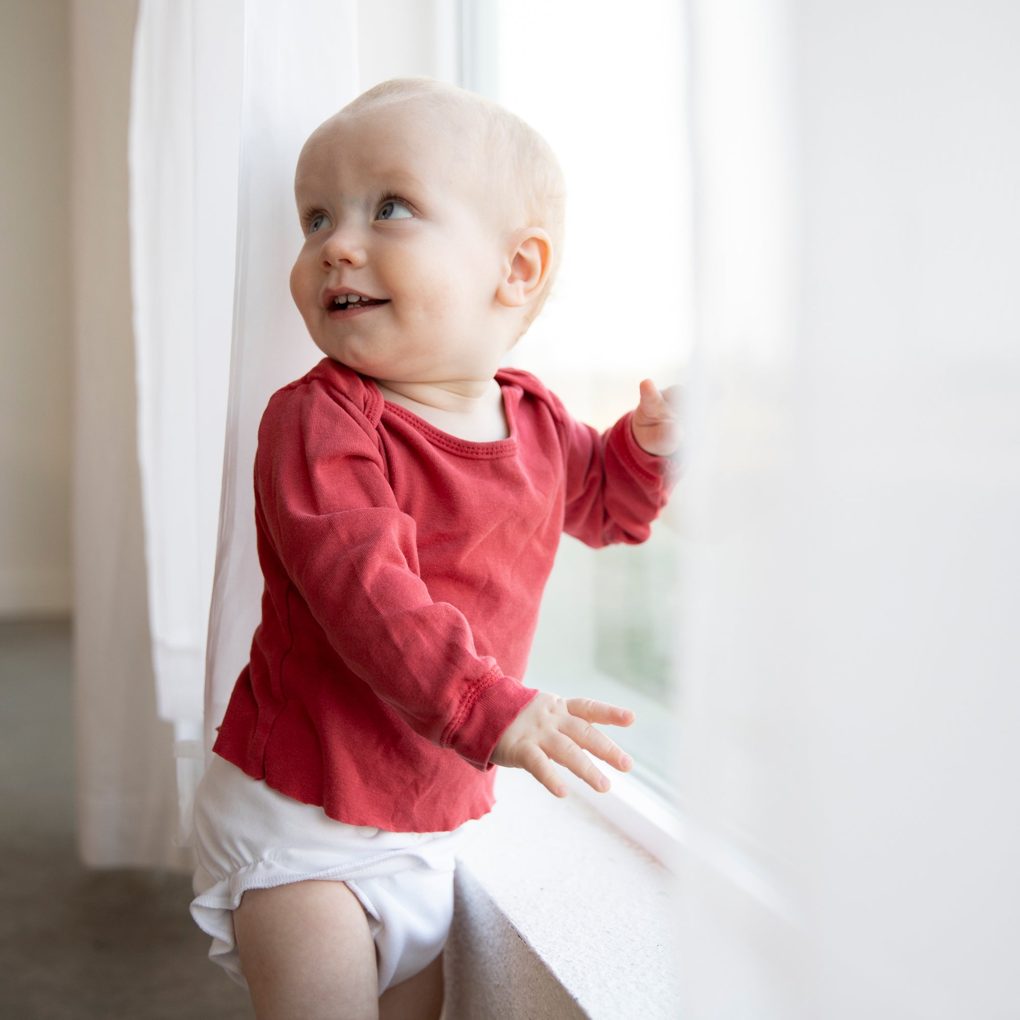 -Image of Baby wearing a Thirsties Duo Fitted Cloth Diaper 