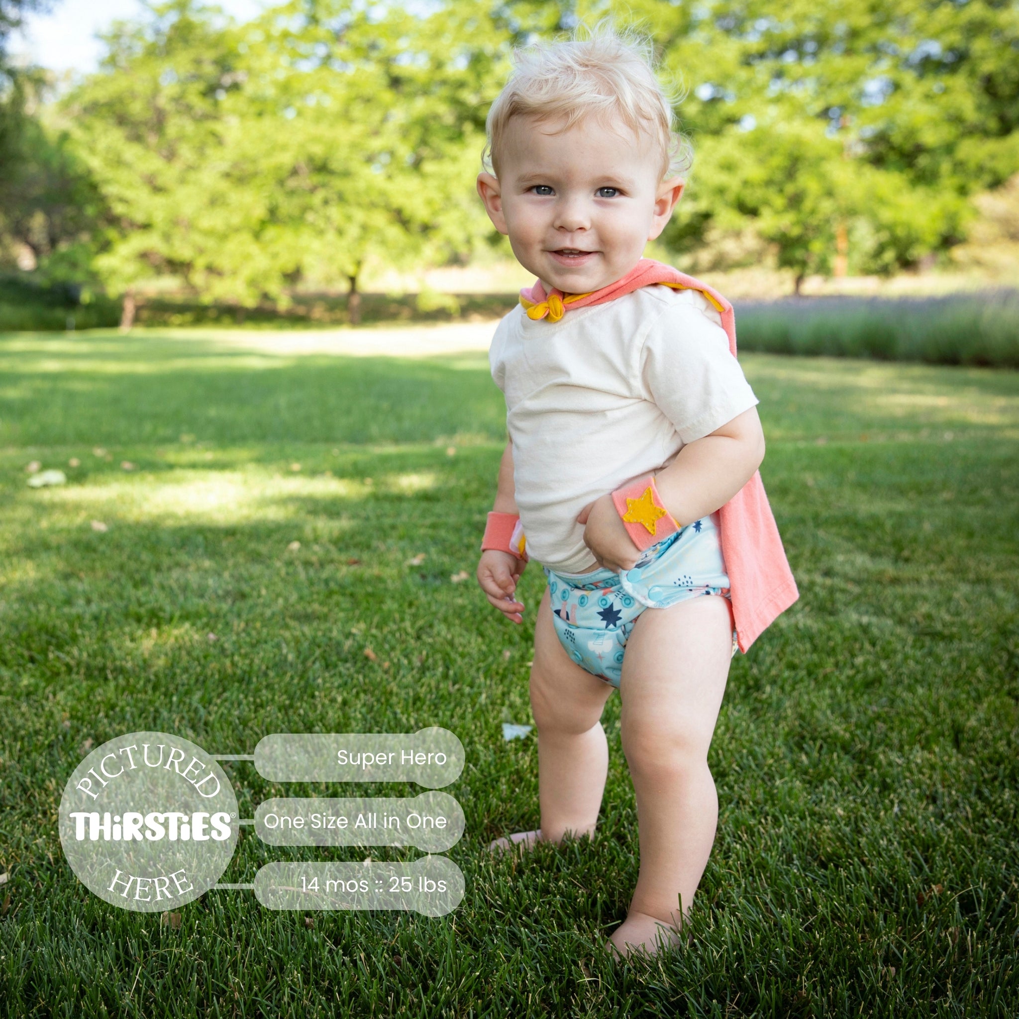 -Image of baby wearing a Thirsties One Size All in One with snap closures in Super Hero