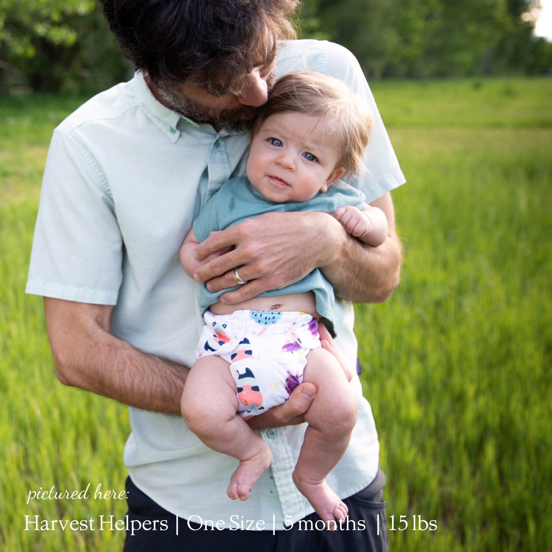 -Image of baby wearing a Thirsties Newborn All in One in Harvest Helpers