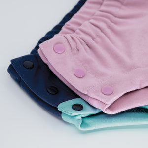 -Image of the side snaps on Thirsties Trainers