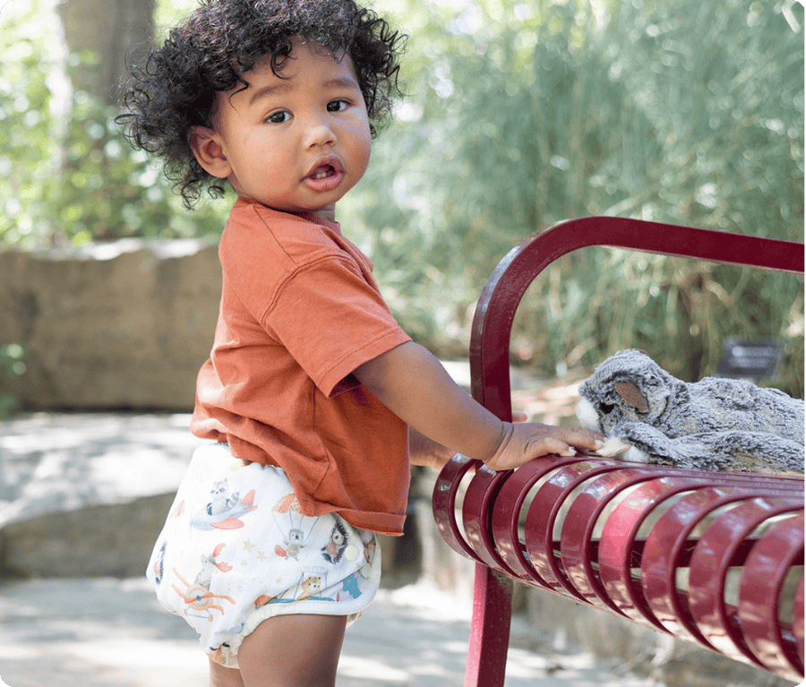 image of baby wearing a thirsties award winning cloth diaper duo wrap cloth diaper cover in oh chute