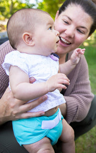 thirsties mom and baby in a maui diaper cover