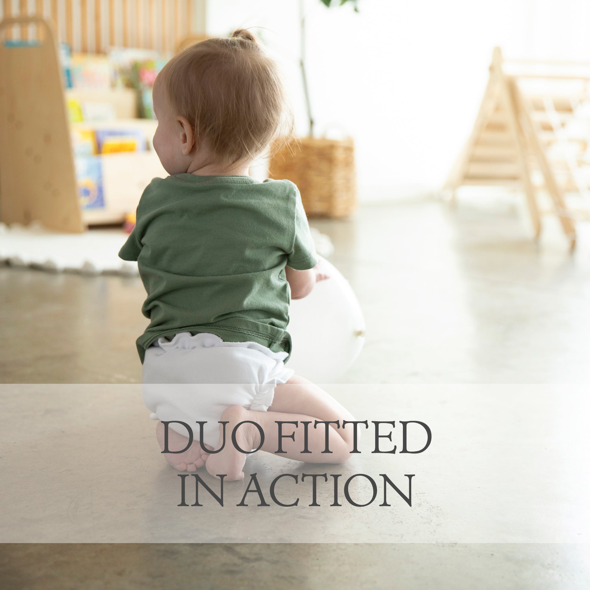 -Image of Thirsties Duo Fitted Diaper a video of the diaper in action