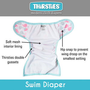 -image of Thirsties swim diaper open view showing soft mesh interior, double gussets, and hip snap to prevent wing droop on the smallest setting